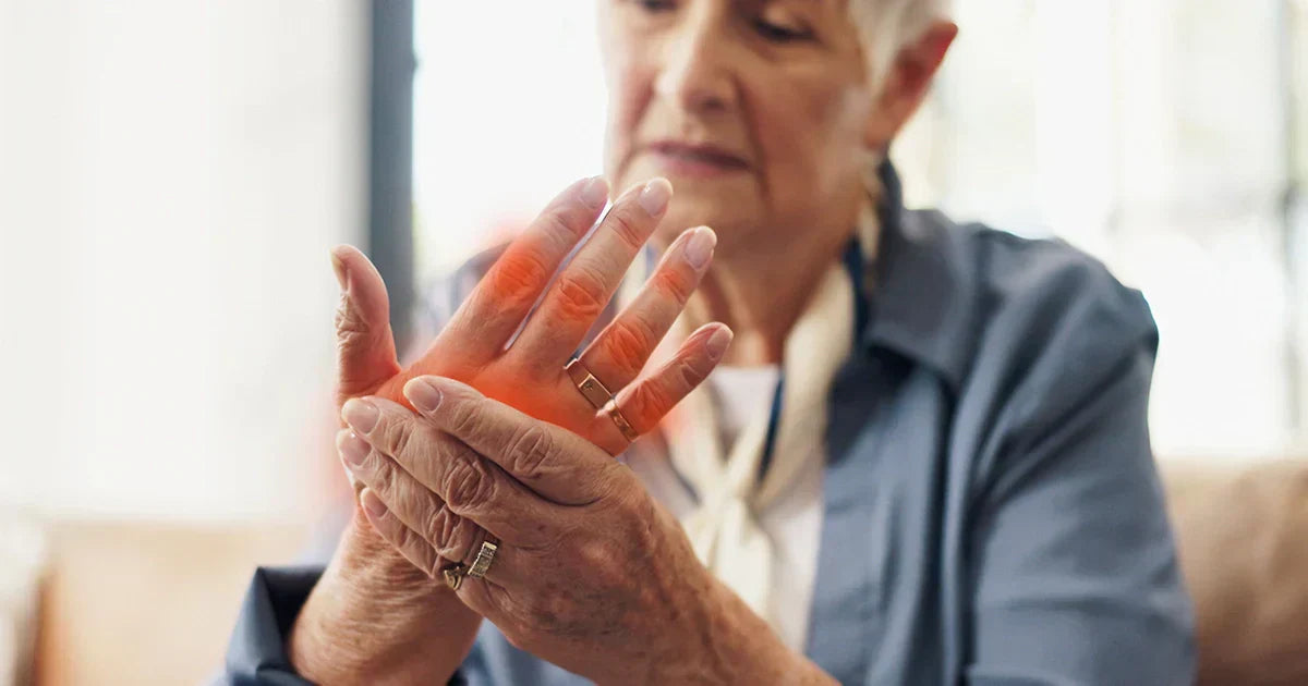 Close-up of hand showing finger joint arthritis pain and inflammation symptoms